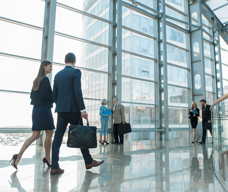 Business professionals in a modern office building
